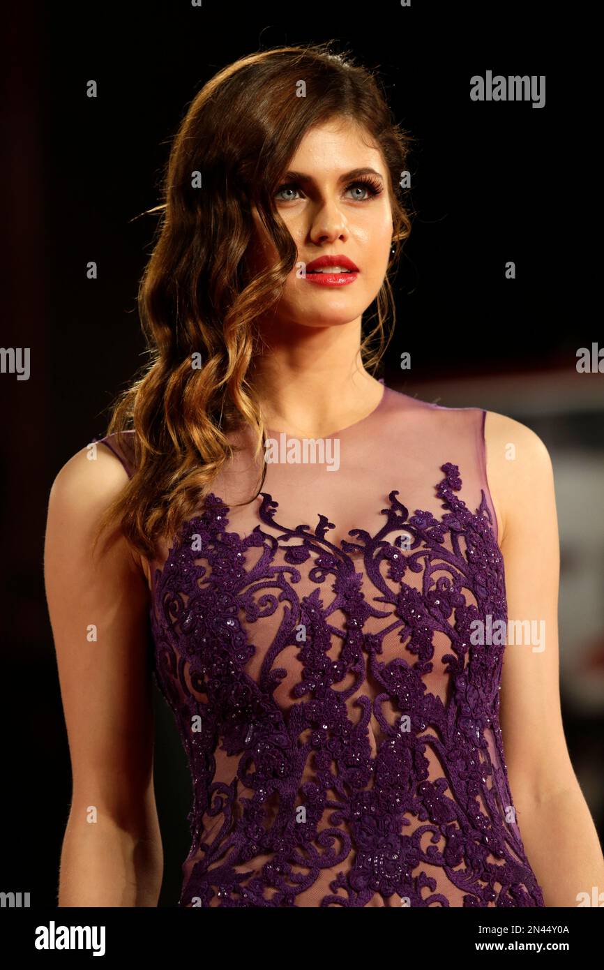 Actress Alexandra Daddario poses for photographers as she arrives for ...