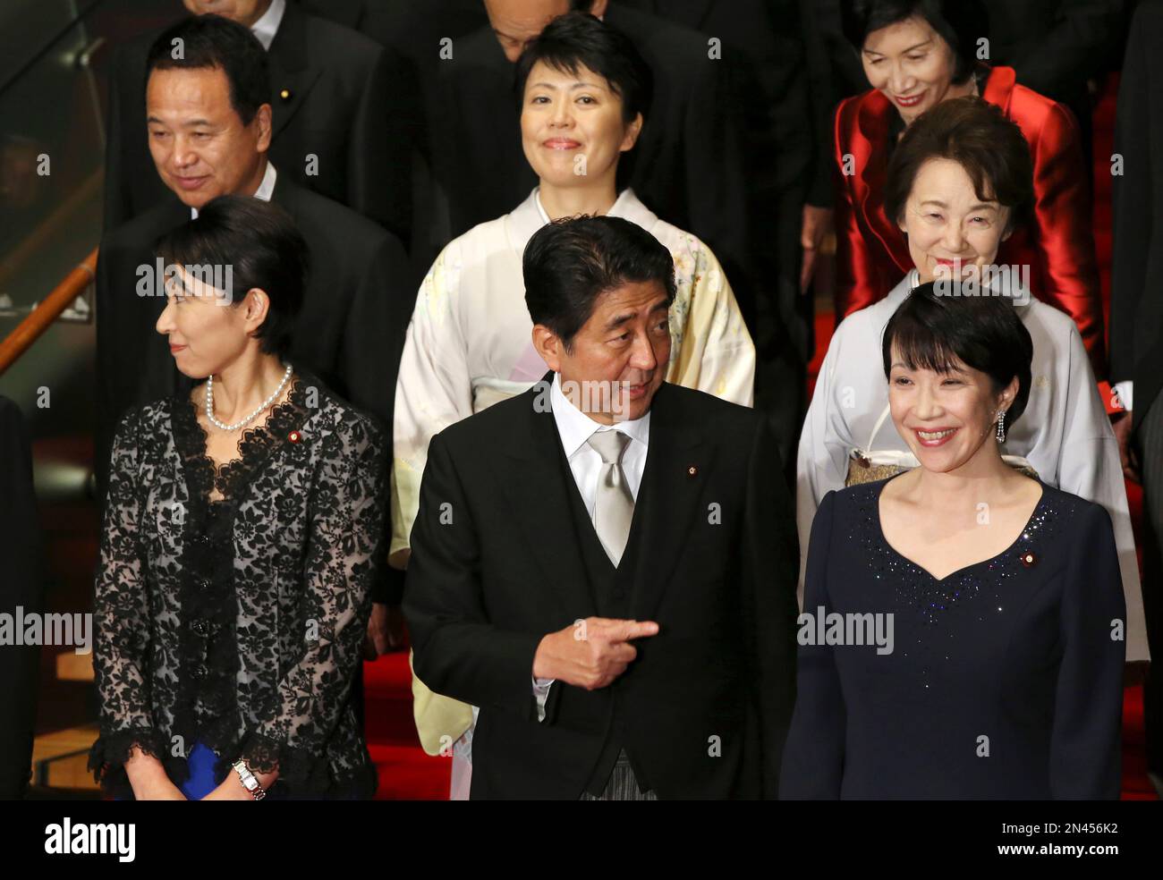 Japan's Prime Minister Shinzo Abe, front row center, and his new ...