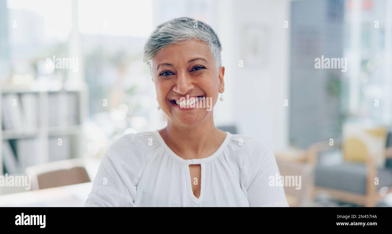 Face, leadership and senior business woman in office ready for task, targets or goals. Boss, ceo and happy, confident and proud female laughing with Stock Photo