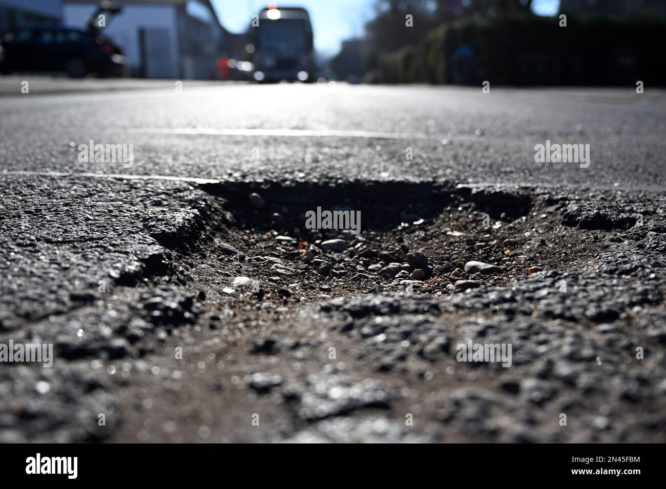 Stadt, Germany. 08th Feb, 2023. A pothole has formed in a road. The