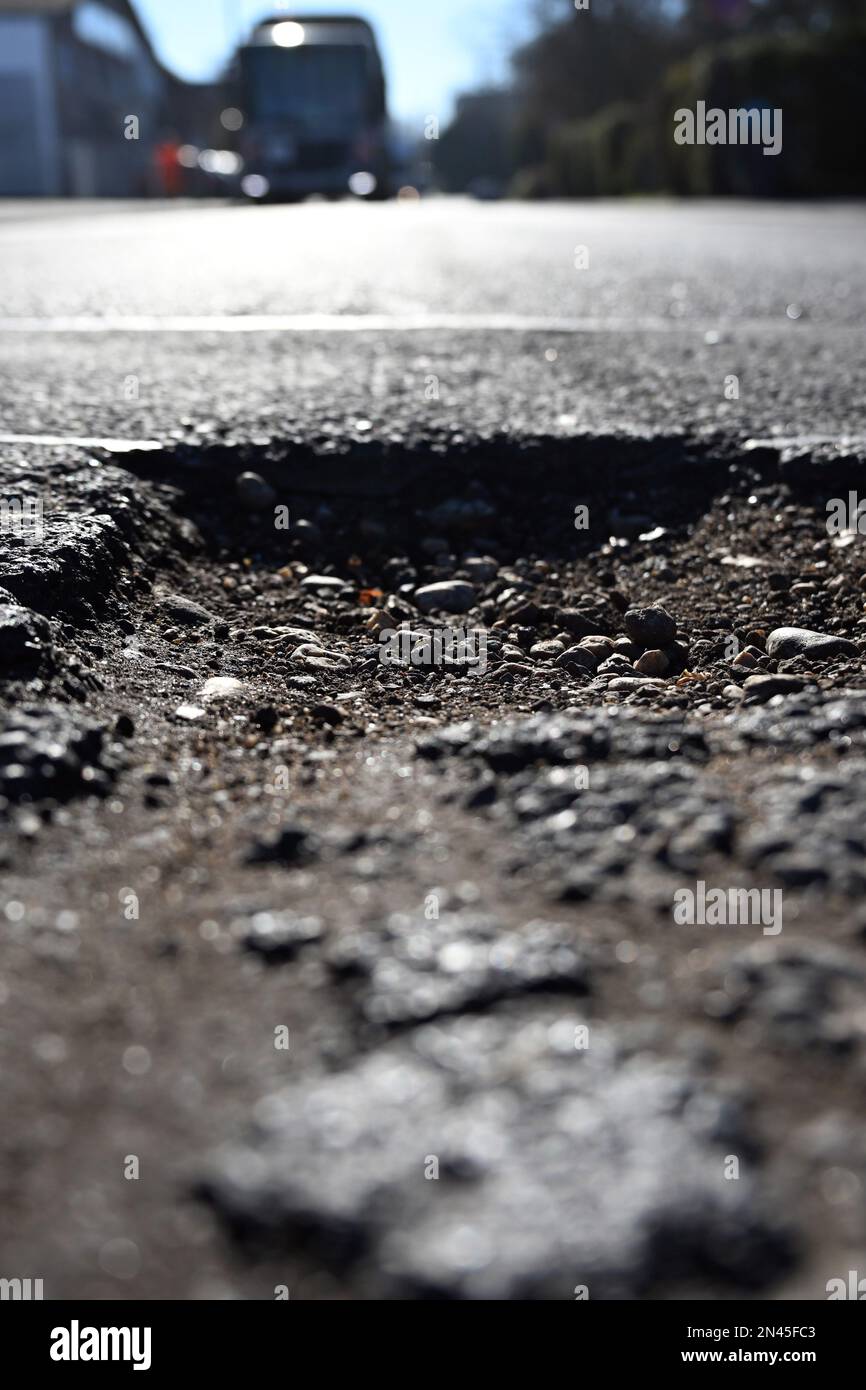Stadt, Germany. 08th Feb, 2023. A pothole has formed in a road. The