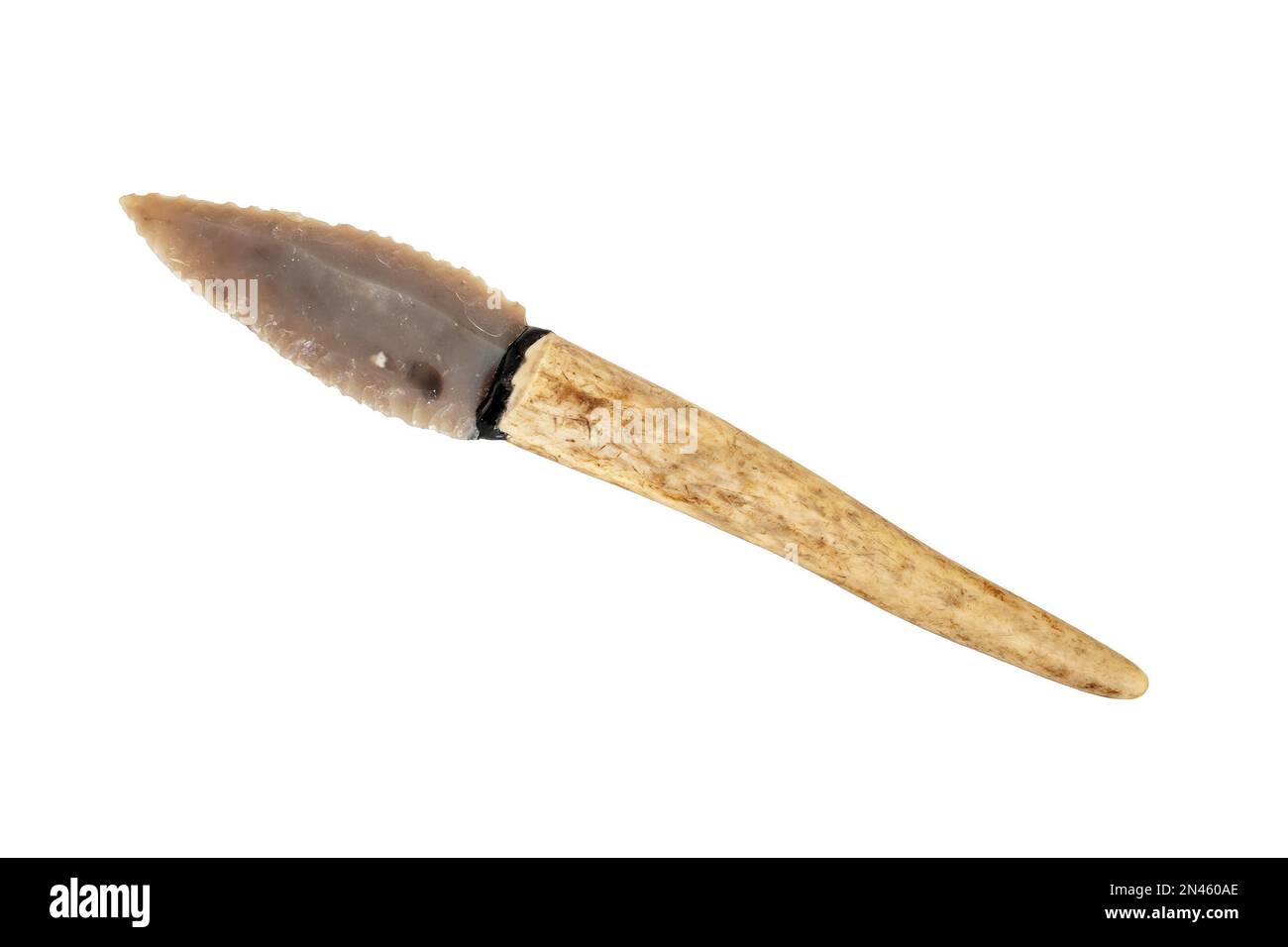 flint knife - stone age tool - leaf blade in deer antler isolated on white background Stock Photo