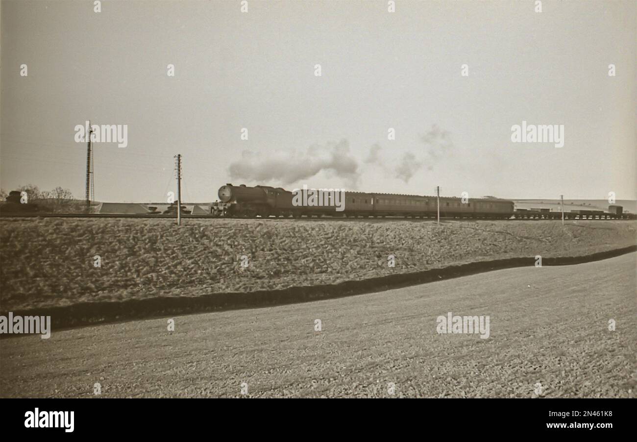 An LNER K3 2-6-0 steam locomotive with a short train on former NBR lines Stock Photo