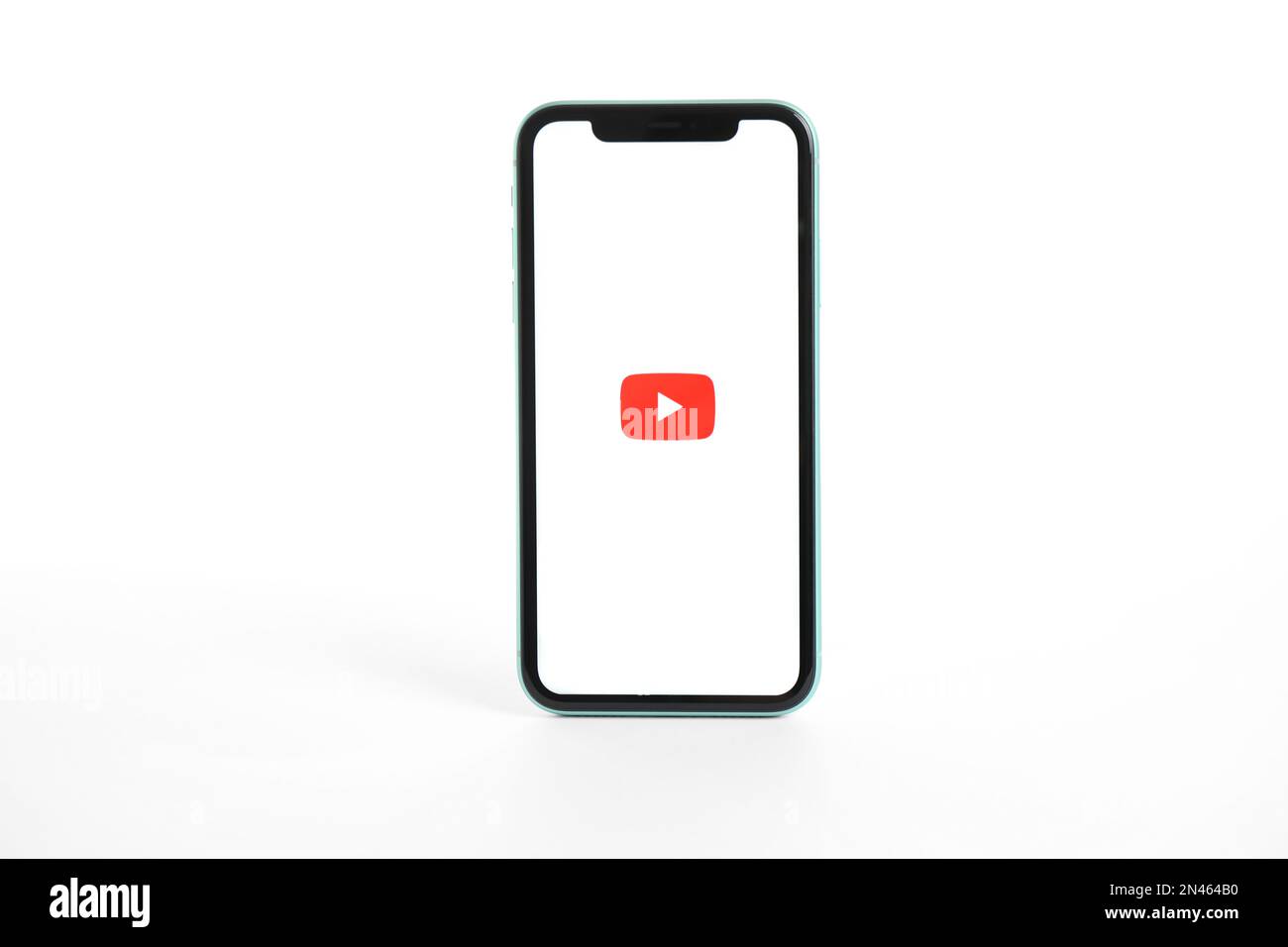 MYKOLAIV, UKRAINE - JULY 9, 2020: iPhone 11 with Youtube app on screen against white background Stock Photo