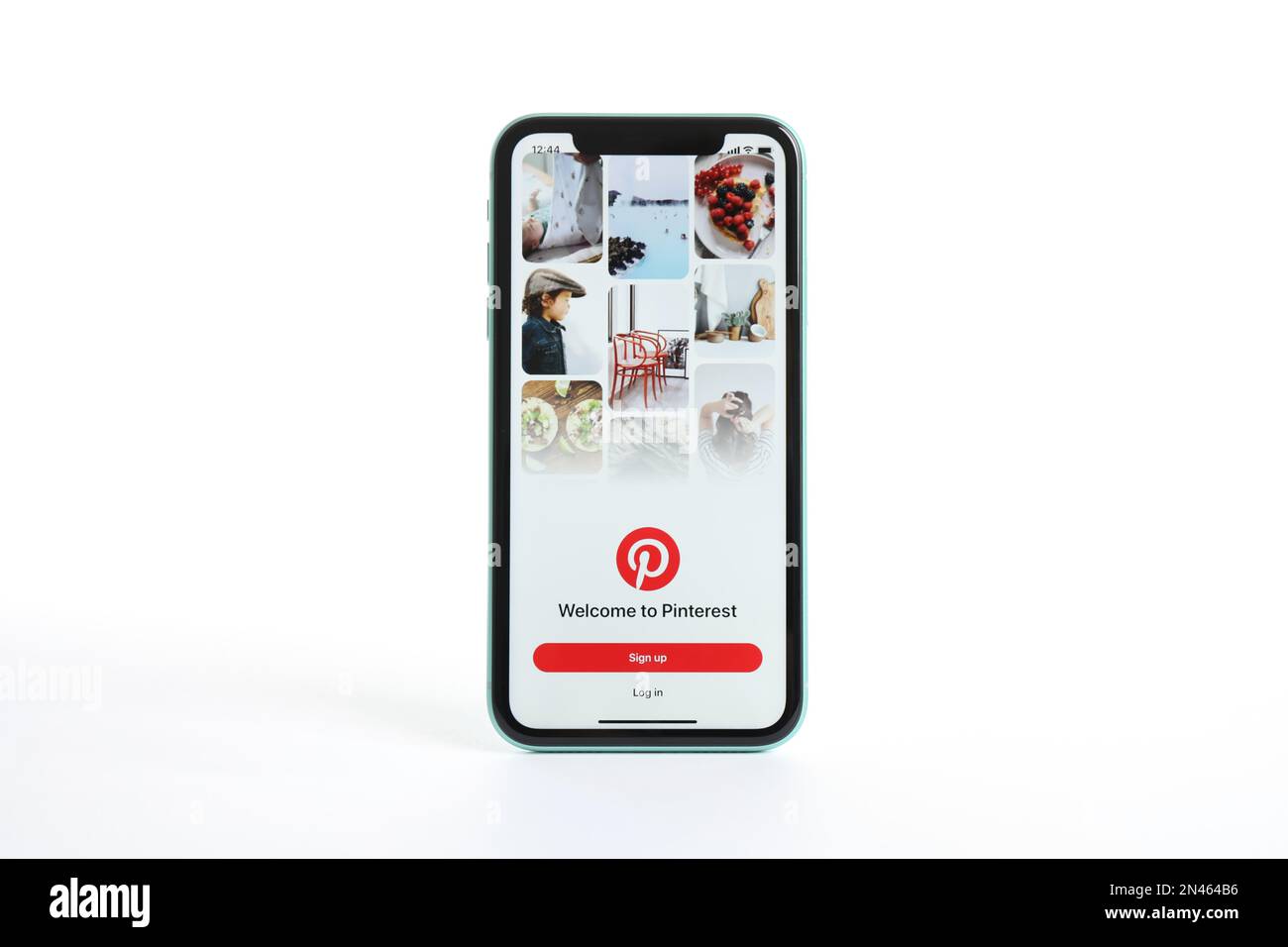 MYKOLAIV, UKRAINE - JULY 9, 2020: iPhone 11 with Pinterest app on screen against white background Stock Photo