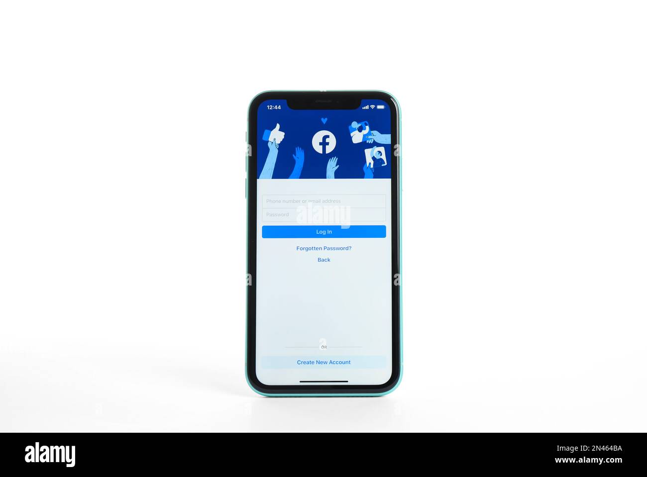 MYKOLAIV, UKRAINE - JULY 9, 2020: iPhone 11 with Facebook app on screen against white background Stock Photo