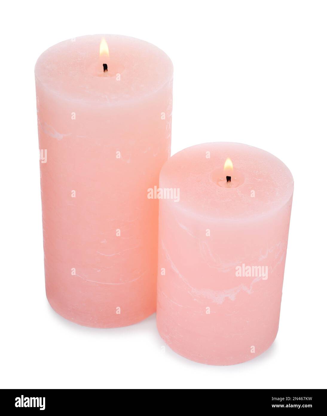 Burning pink wax candles on white background Stock Photo Alamy