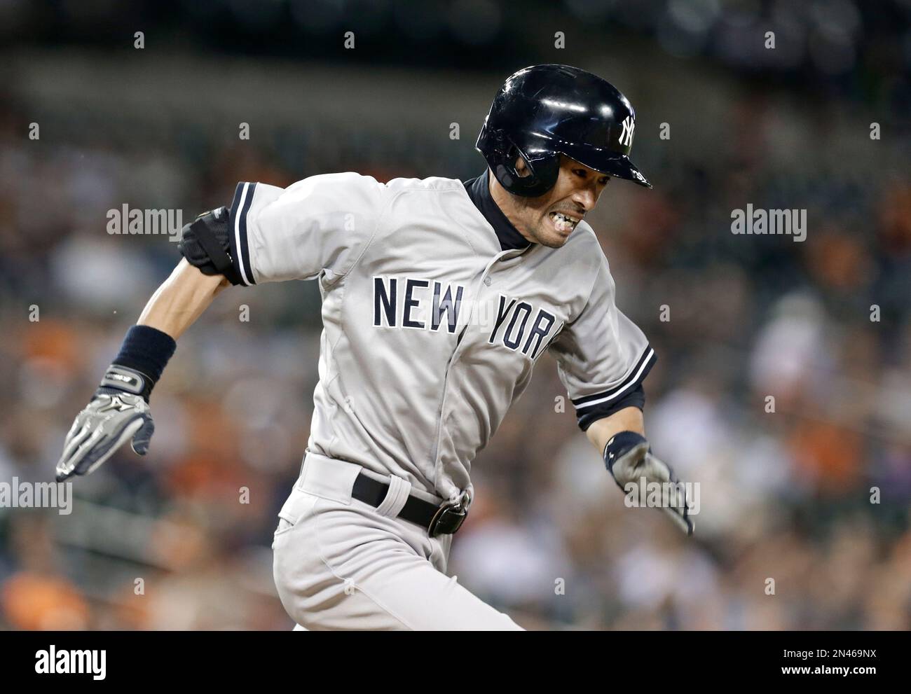 New York Yankees' Ichiro Suzuki digs out a single against the Detroit