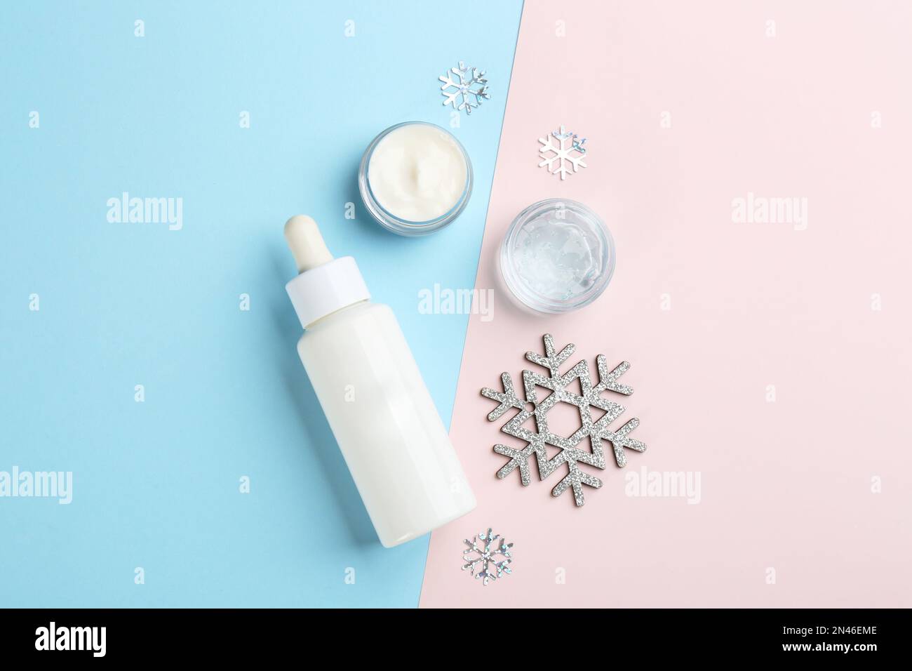 Flat lay composition with different cosmetic products on color ...