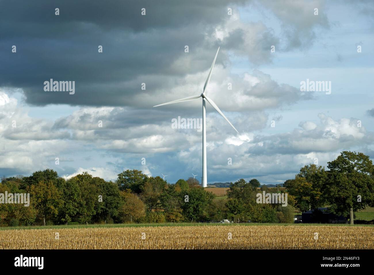Country landscape with a wind turbine (Nord-Mayenne, Pays de la Loire, France). Stock Photo