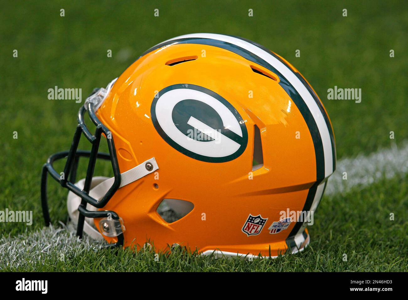 A Green Bay Packers football helmet on the field prior to the start of an NFL pre-season football game between the Green Bay Packers and Oakland Raiders Friday Aug. 22, 2014, in A Green Bay Packers football helmet on the field prior to the start of an NFL pre-season football game between the Green Bay Packers and Oakland Raiders Friday Aug. 22, 2014, in