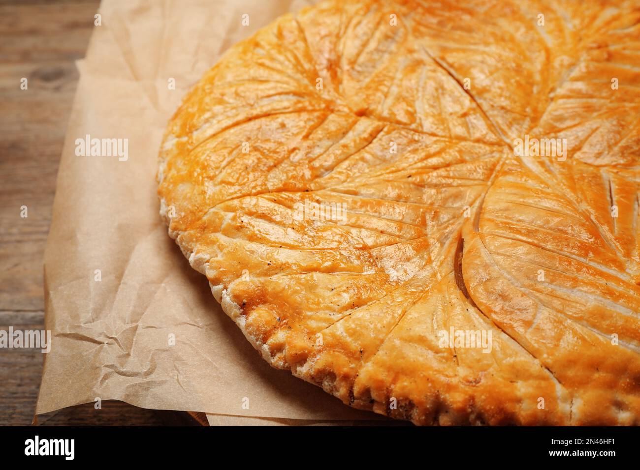 Traditional galette des rois on wooden table, closeup Stock Photo - Alamy