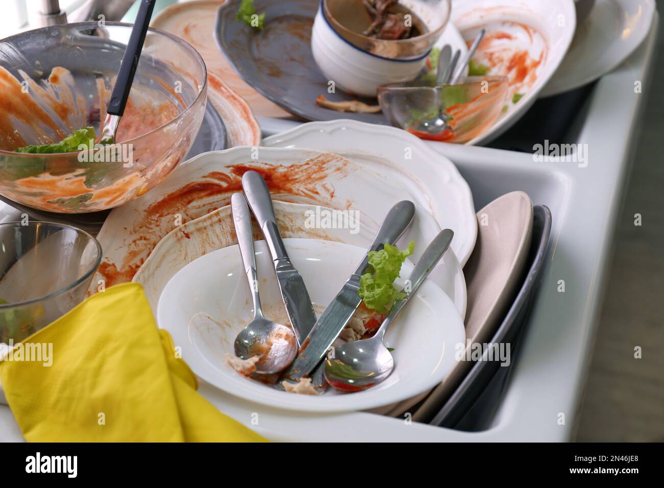 Dirty dishes in sink after new year party Stock Photo Alamy