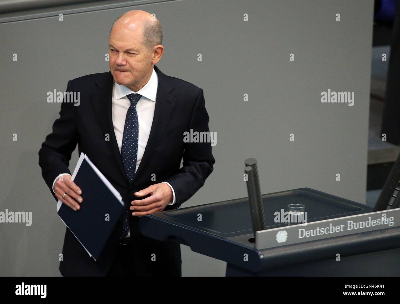 Berlin, Germany. 08th Feb, 2023. Chancellor Olaf Scholz (SPD) leaves the speaker's podium in the German Bundestag after delivering a government statement on the upcoming EU summit. Credit: Wolfgang Kumm/dpa/Alamy Live News Stock Photo