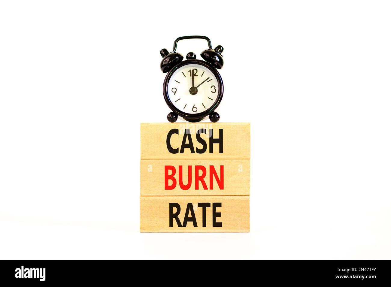 Cash burn rate symbol. Concept words Cash burn rate on wooden blocks on