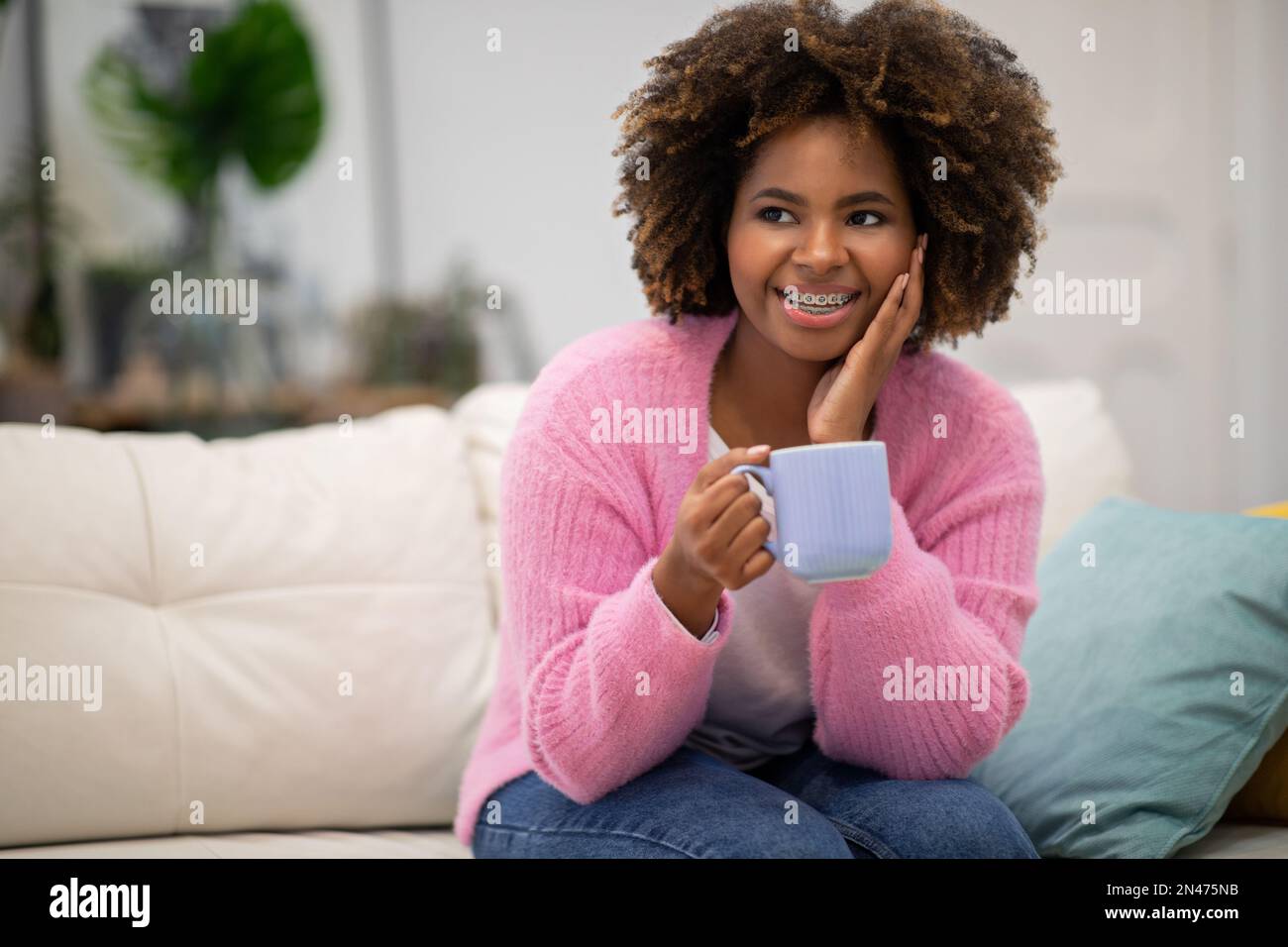 Happy african american woman drinking tea at home, copy space Stock ...
