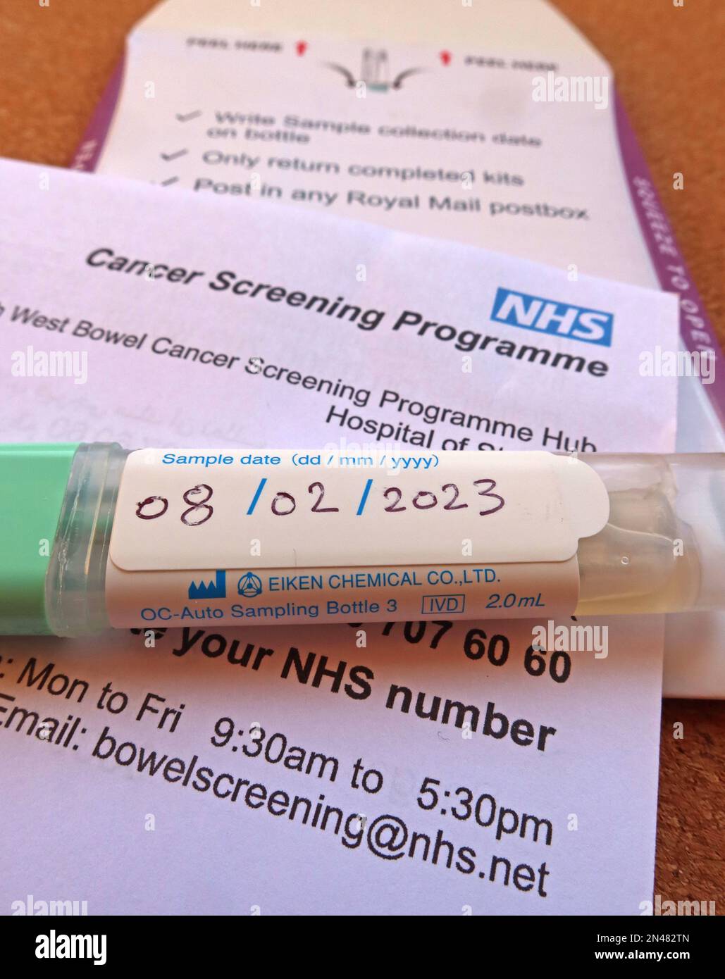 Early bowel cancer screening programme sample, dated, prepared and ready to post, North West England, UK Stock Photo