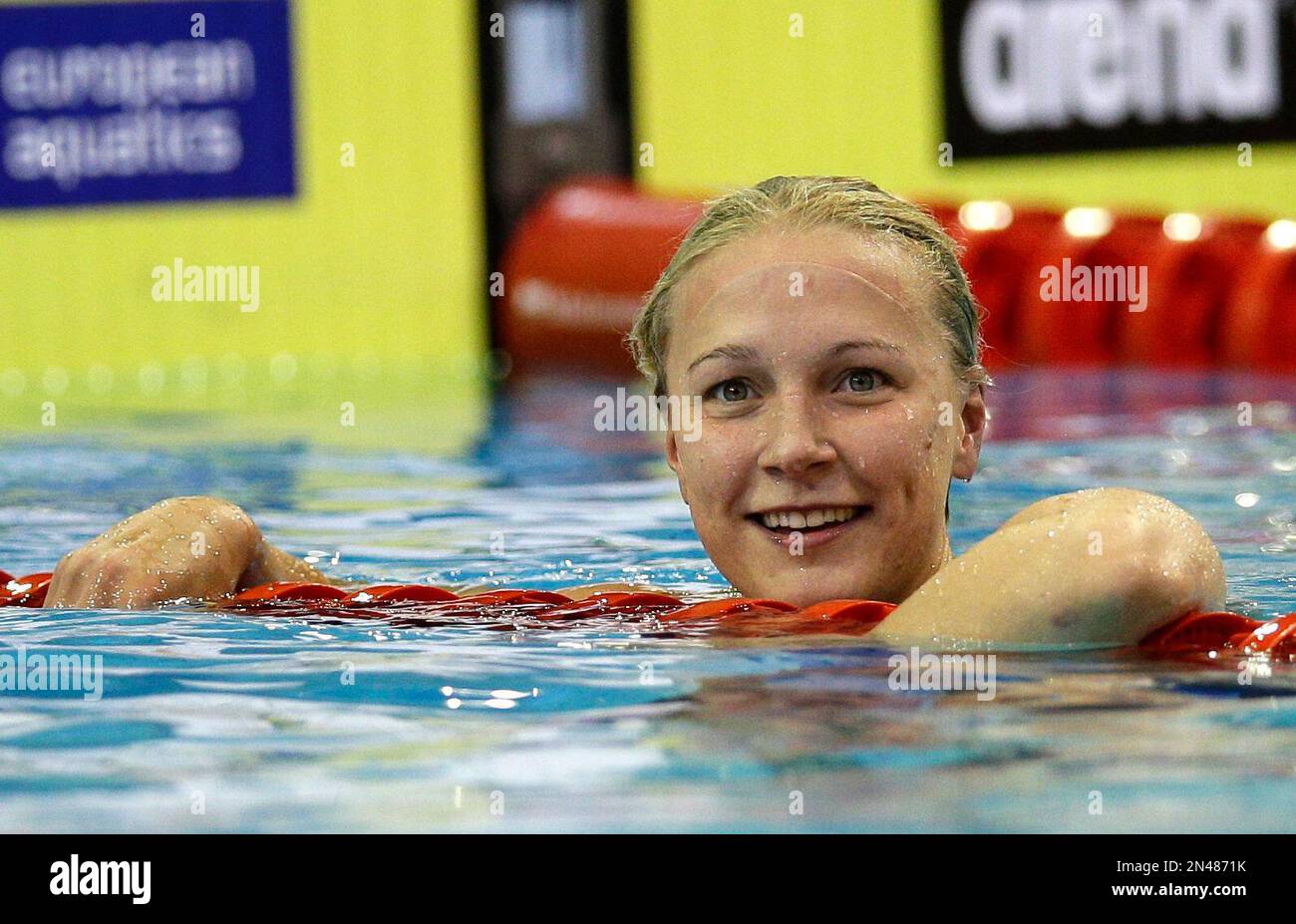 Sweden's Sarah Sjoestroem smiles after winning the gold medal in the