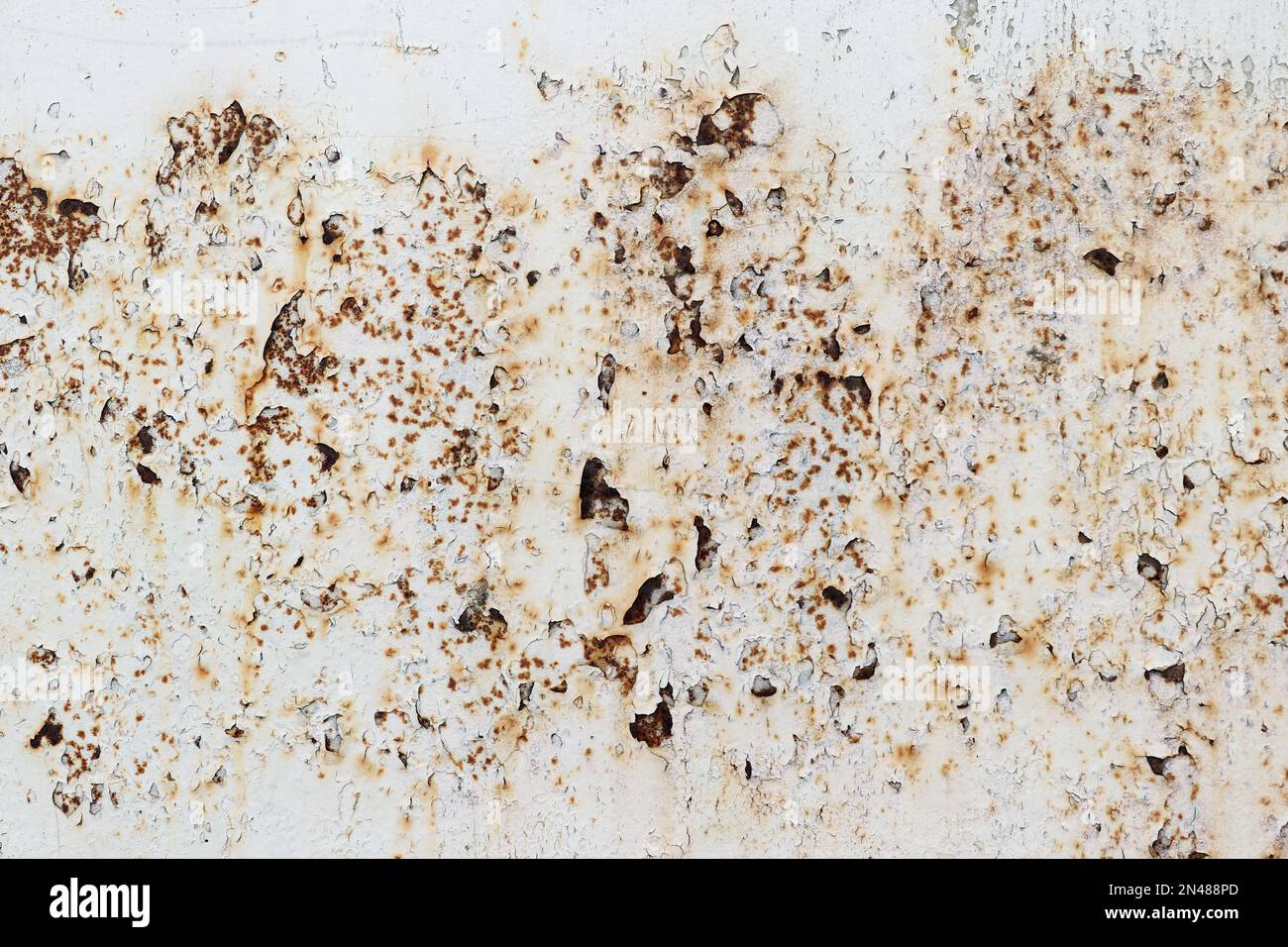 Detail of the flaking paint from the metal surface Stock Photo
