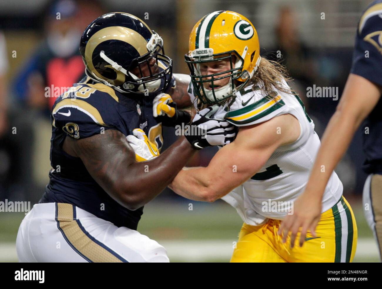 St. Louis Rams offensive tackle Greg Robinson, left, blocks Green Bay ...
