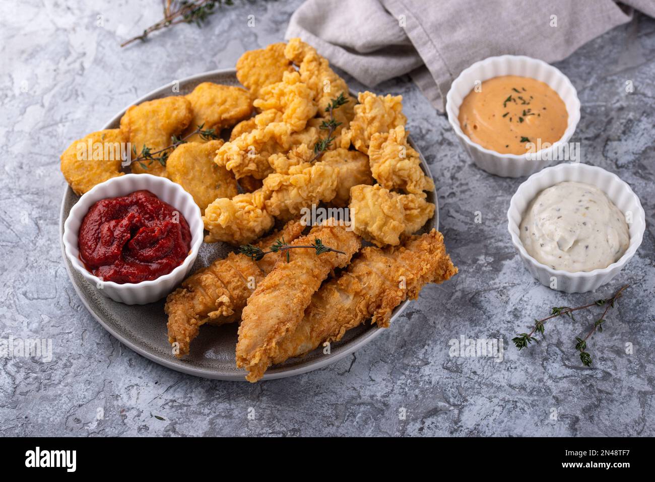 Chicken nuggets, strips and bites Stock Photo Alamy