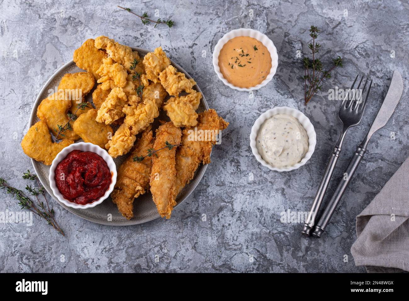 Chicken nuggets, strips and bites Stock Photo Alamy