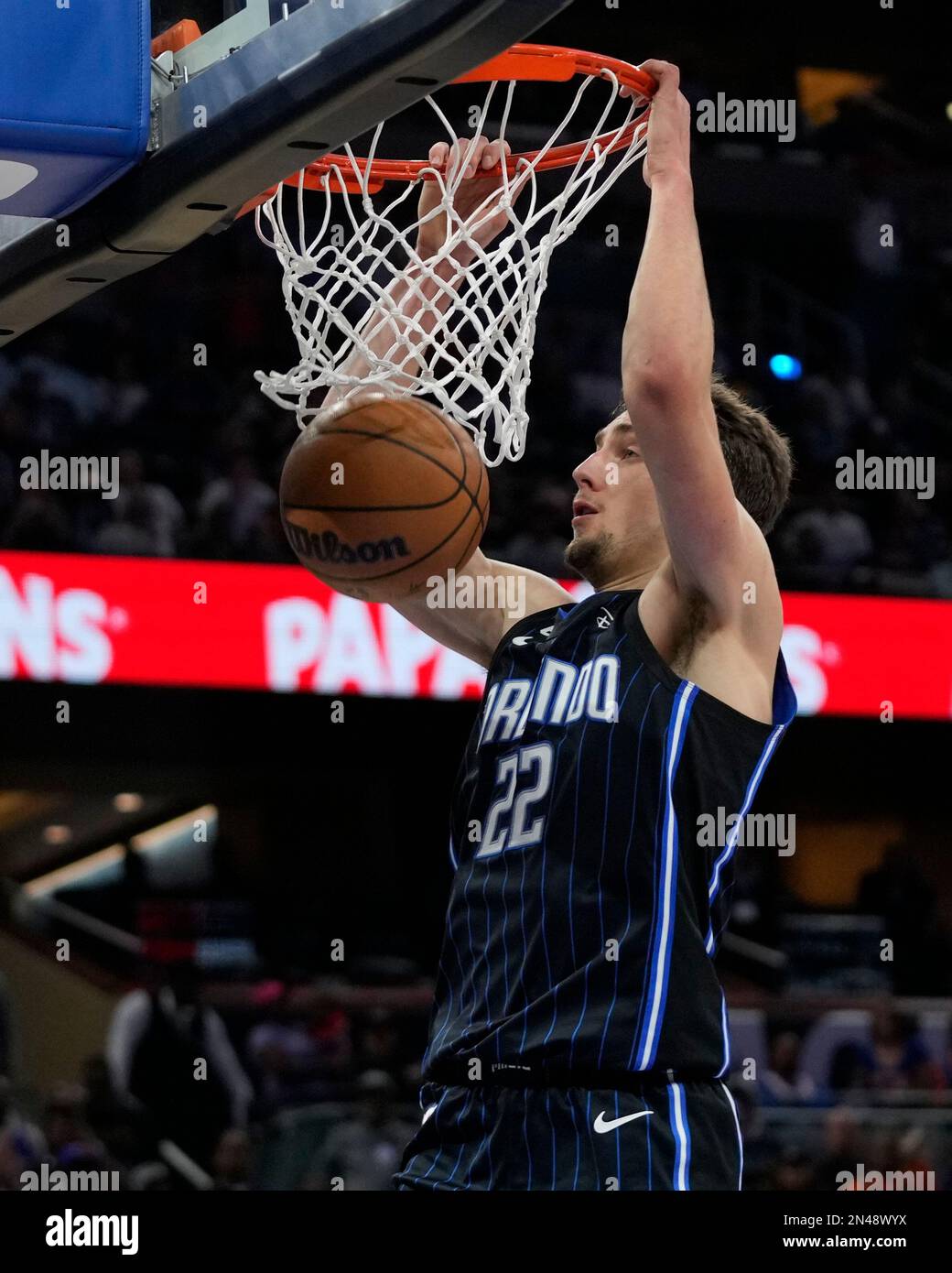 Orlando Magic's Franz Wagner (22) dunks the ball during the second half of  an NBA basketball game against the New York Knicks, Tuesday, Feb. 7, 2023,  in Orlando, Fla. (AP Photo/John Raoux