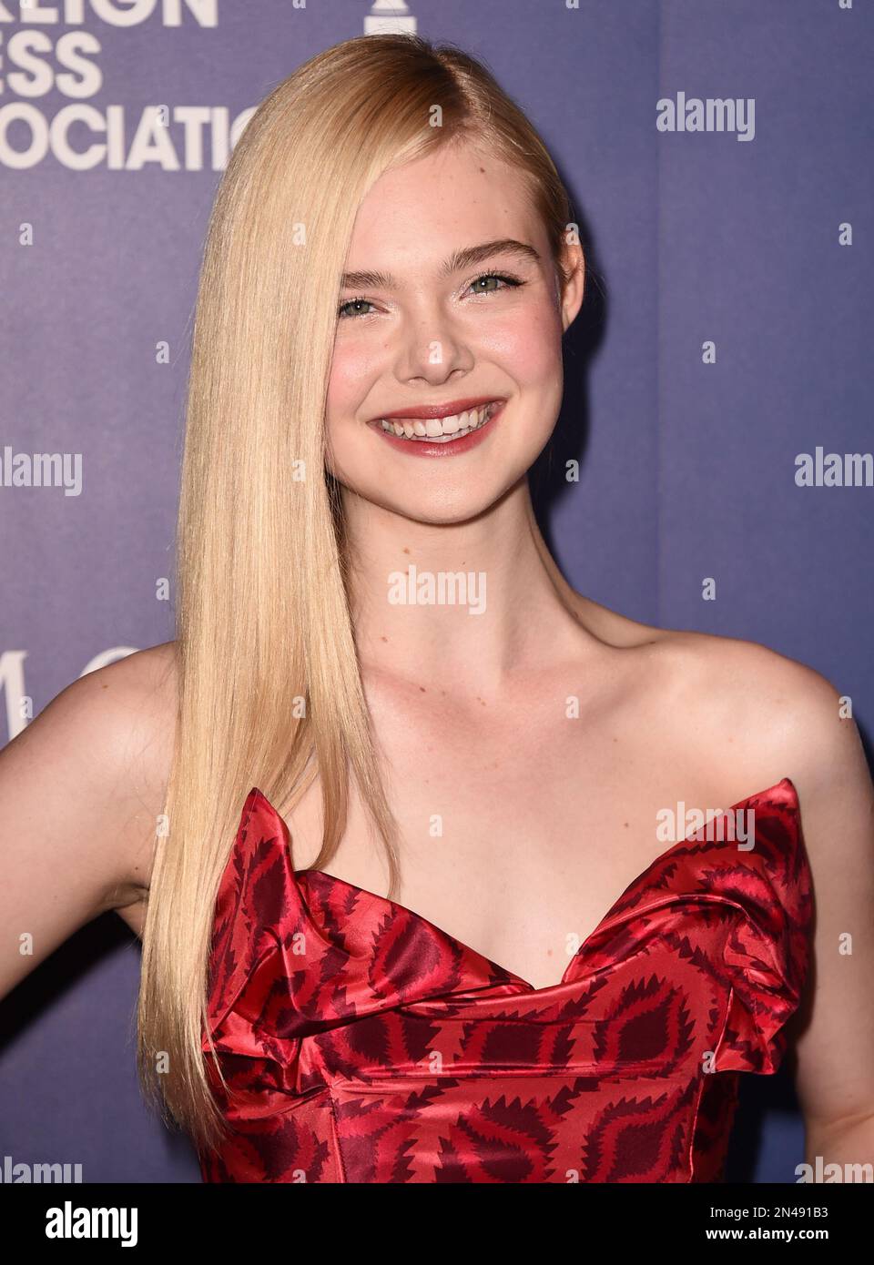 Elle Fanning arrives at the Hollywood Foreign Press Association's Grants  Banquet at the Beverly Hilton hotel on Thursday, Aug. 14, 2014, in Beverly  Hills, Calif. (Photo by Jordan Strauss/Invision/AP Stock Photo -, image size:960x1390