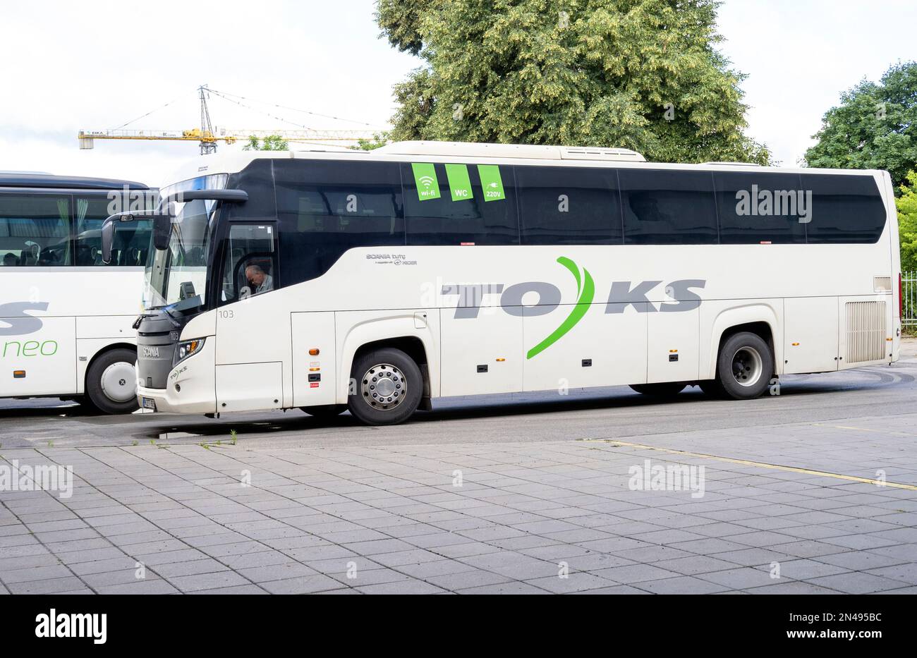 VILNIUS - JULY 09: Passenger bus by Toks company at the bus station in Vilnius on July 09. 2022 in Lithuania Stock Photo