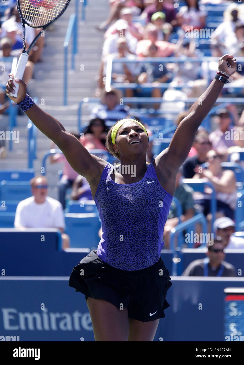 Serena Williams reacts after defeating Samantha Stosur, from Australia
