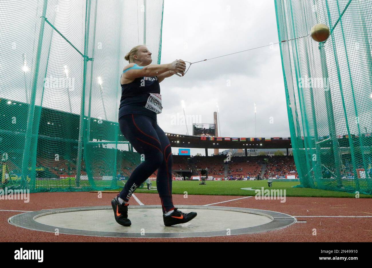 France's Alexandra Tavernier makes an attempt in the women's hammer