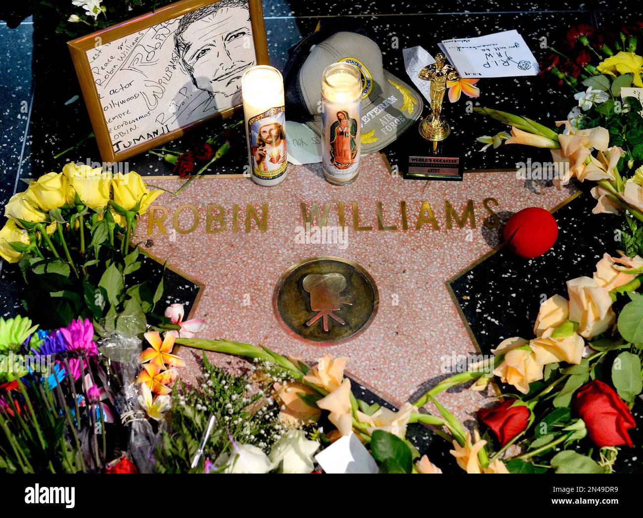 Flowers are placed in memory of actor/comedian Robin Williams on