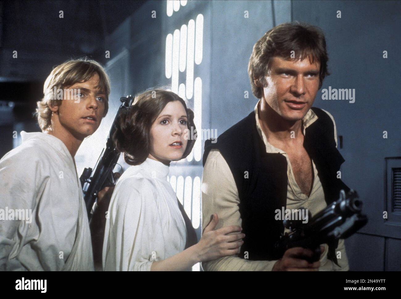 Star Wars  Star Wars Episode IV : A New Hope  Mark Hamill, Carrie Fisher & Harrison Ford  Luke Skywalker, Princess Leia, Han Solo Stock Photo