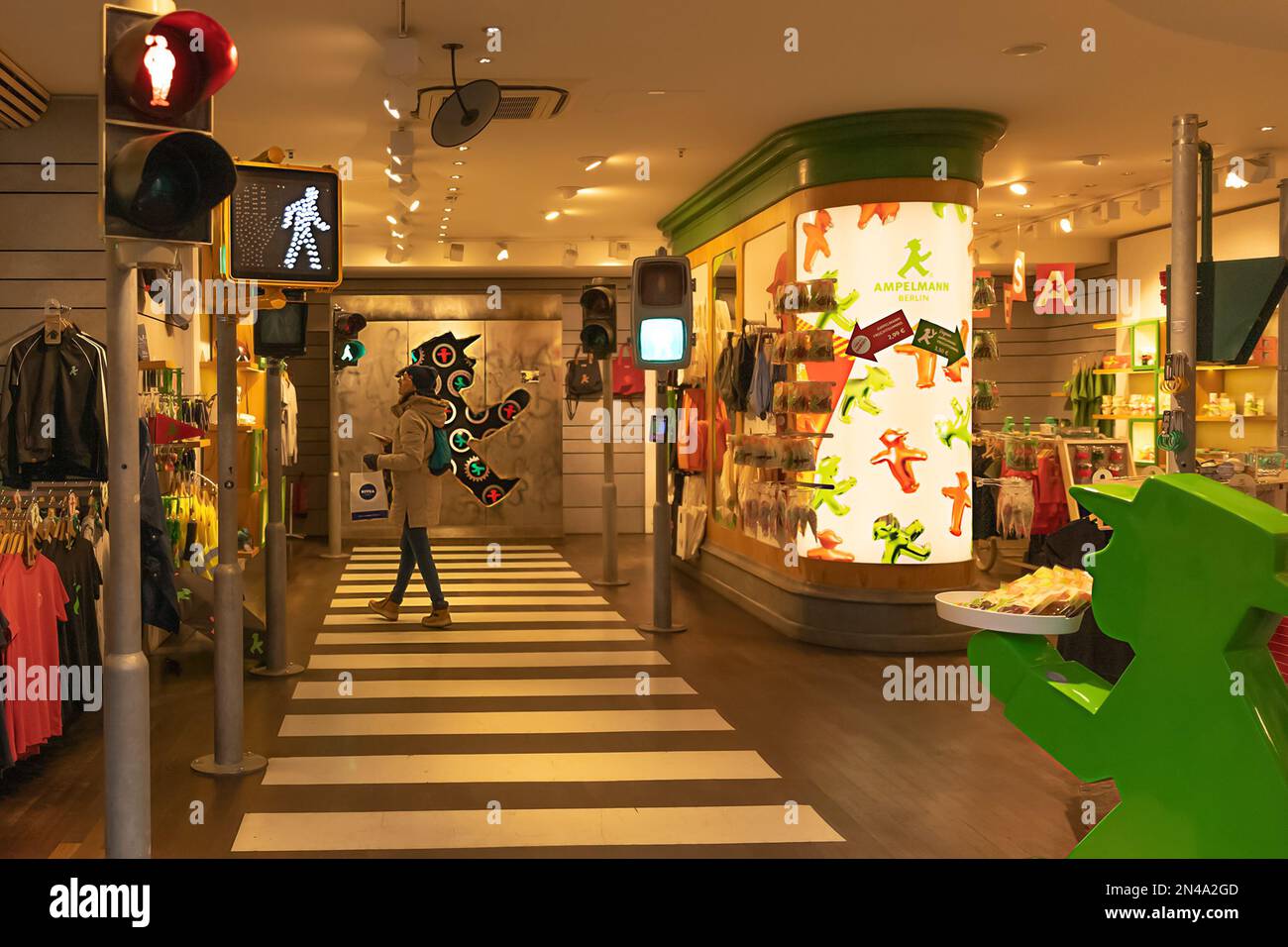 Inside the shop of traffic light men, or Ampelmännchen. The green and red man with a hat. Pedestrian traffic lights symbol in Berlin. Stock Photo