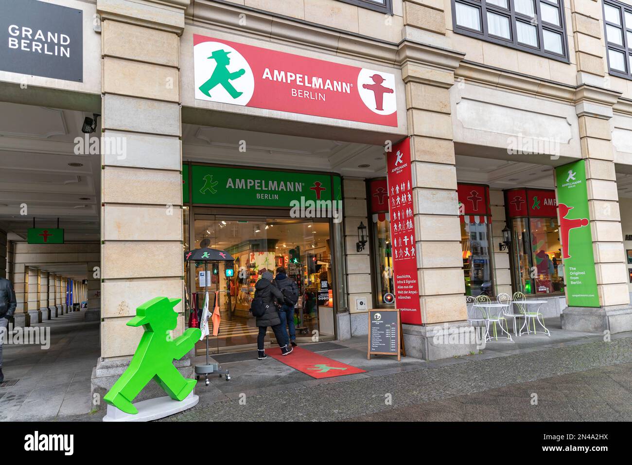 Inside the shop of traffic light men, or Ampelmännchen. The green and red man with a hat. Pedestrian traffic lights symbol in Berlin. Stock Photo