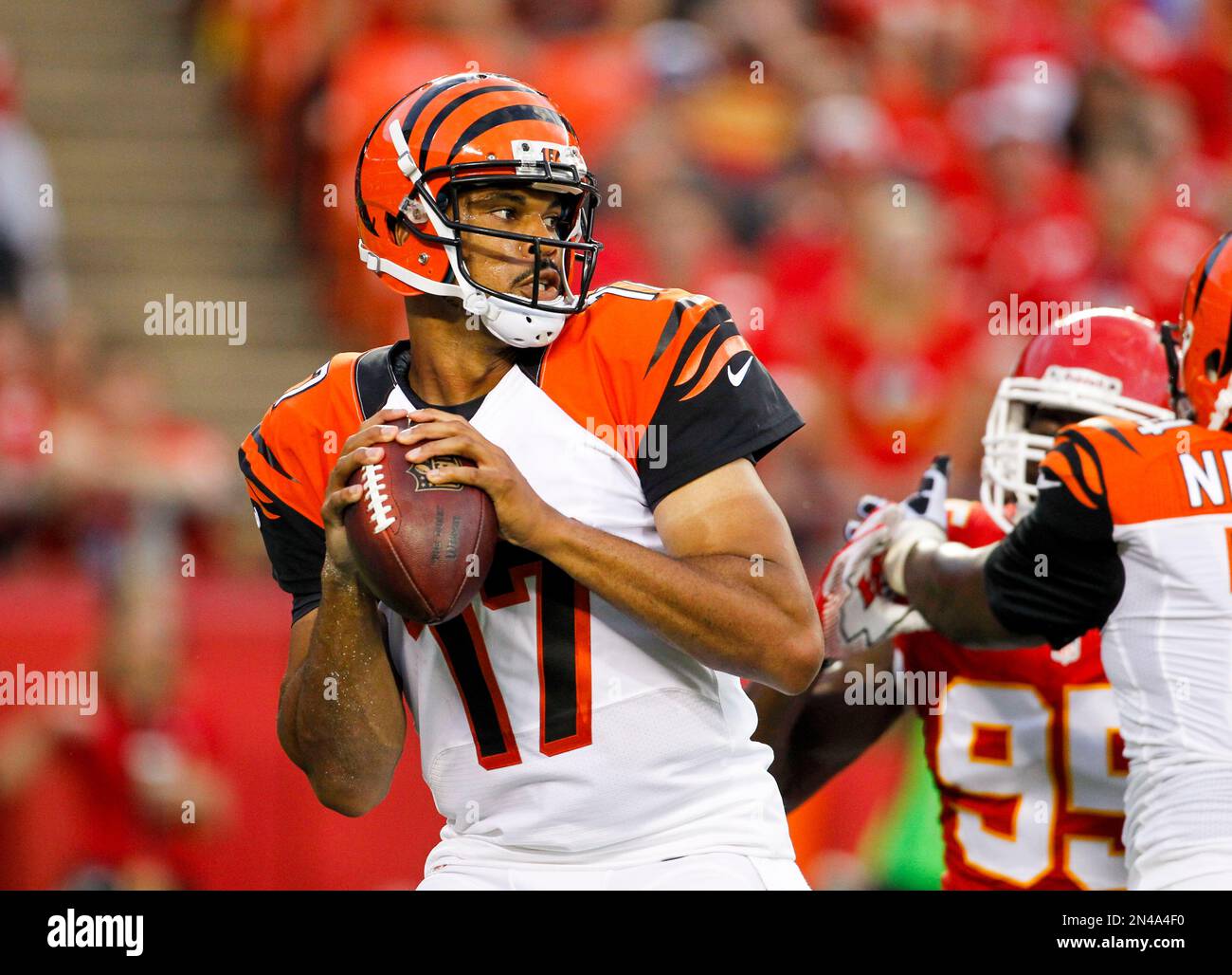 Cincinnati Bengals quarterback Jason Campbell (17) looks for a receiver in  the first half of an NFL preseason football game against the Kansas City  Chiefs Thursday, Aug. 7, 2014, in Kansas City,
