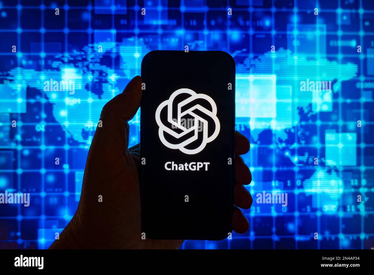 Digital composite image of OpenAI ChatGPT chatbot logo shown on mobile ...