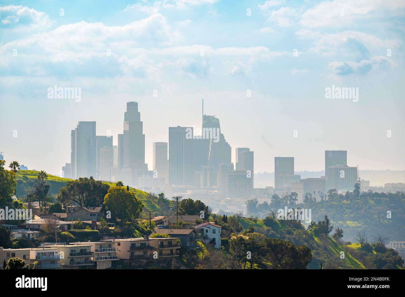 An aerial view of the beautiful Los Angeles skyline in the morning fog ...