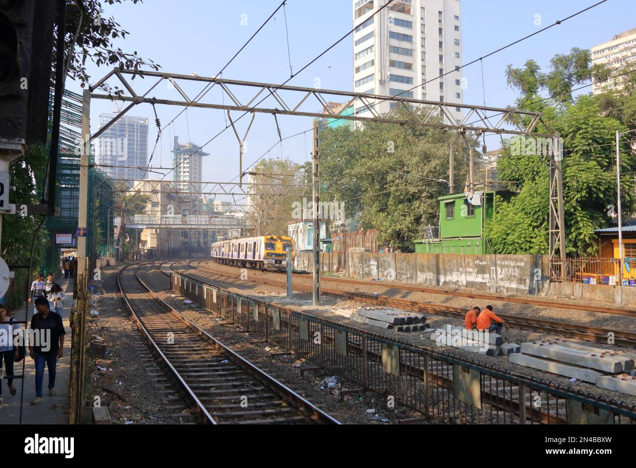 December 21 2022 - Mumbai, Maharashtra in India: Mumbai local train of indian railway running in the city of mumbai Stock Photo