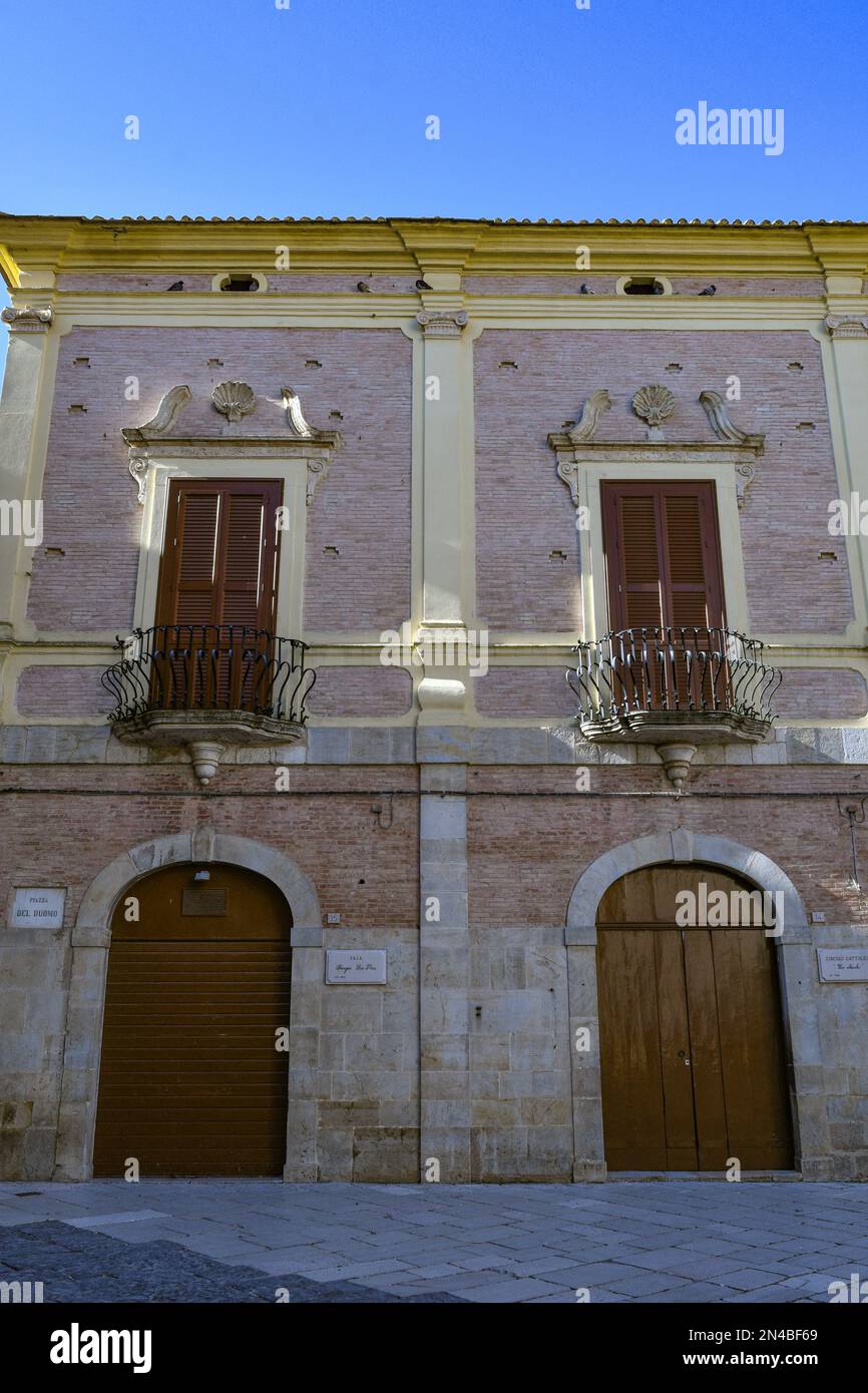 The facade of a noble building located in Lucera, an ancient Apulian town in the province of Foggia, Italy.. Stock Photo