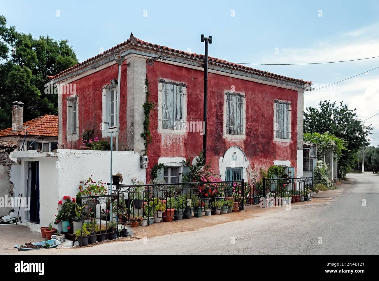 Old house decorated with flower pots, Zakynthos Greece Stock Photo