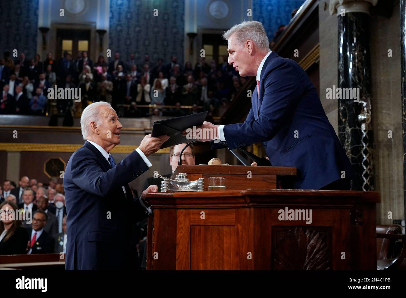 President Joe Biden hands a copy of his speech to House Speaker Kevin McCarthy of Calif., before he delivers his State of the Union address to a joint session of Congress, at the Capitol in Washington, Tuesday, Feb. 7, 2023. Photo by Jacquelyn Martin/Pool/ABACAPRESS.COM Stock Photo