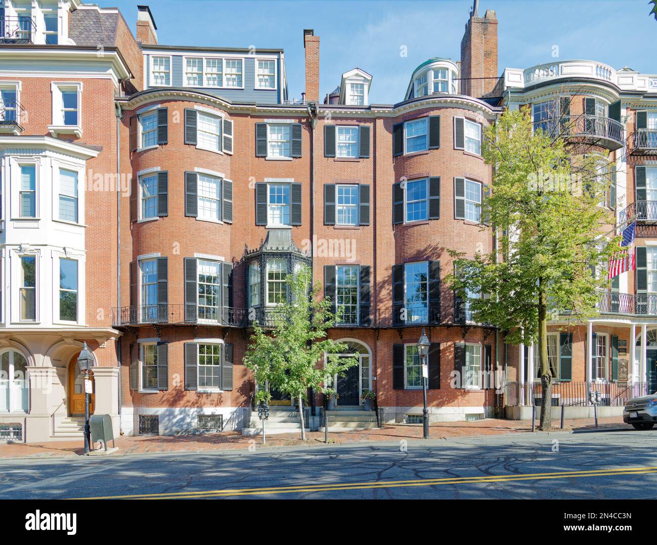 Boston Beacon Hill 5657 Beacon Street is a Federal style brick “double house” on a stone base