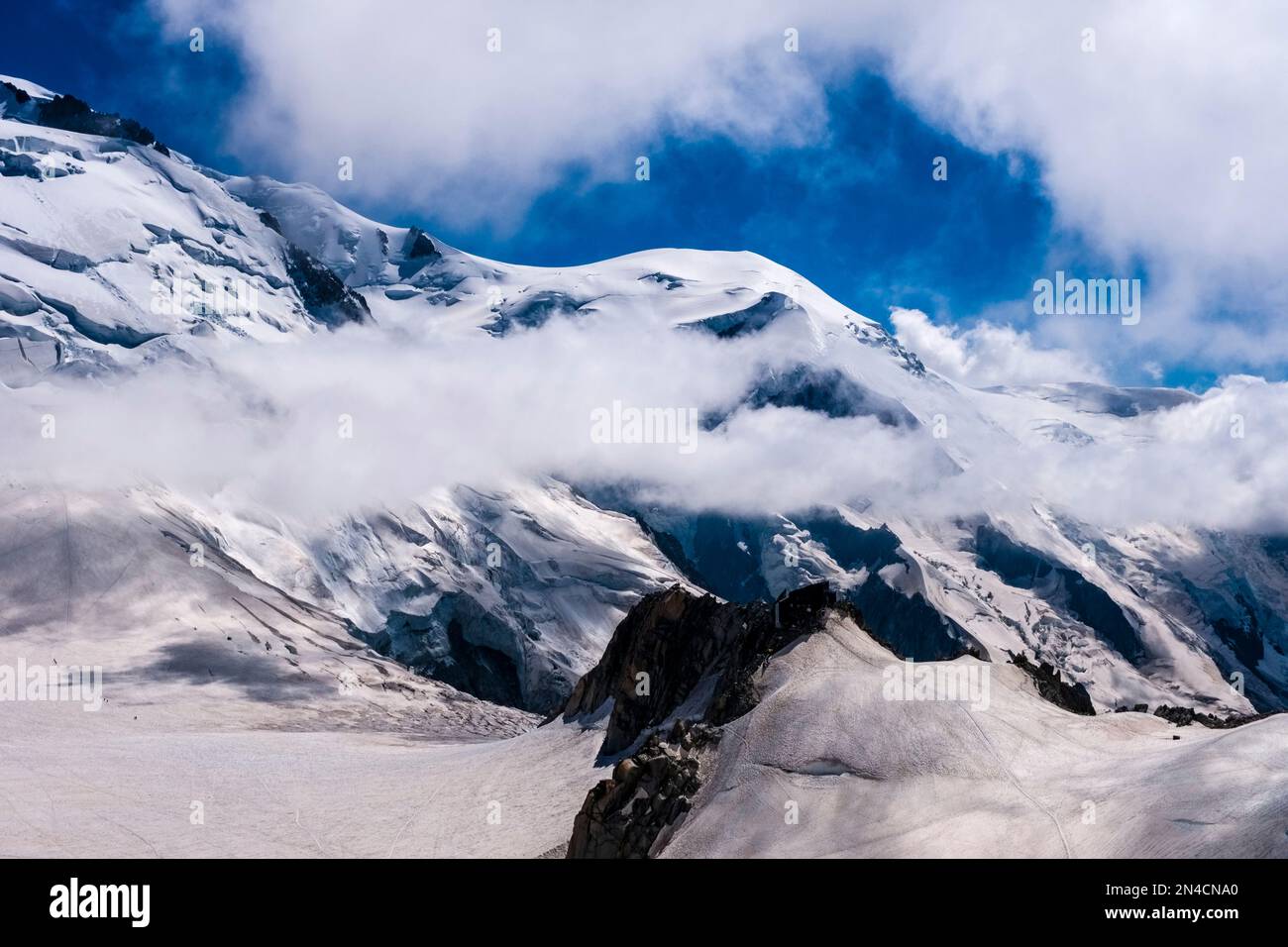 View from Aiguille du Midi of the summit of Mont Blanc, clouds are ...
