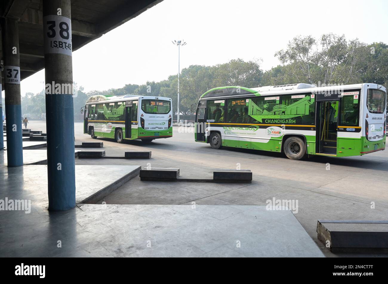 INDIA, Chandigarh, Sector 17, Inter State bus terminal, Ashok Leyland electric bus for public transport in the city, town planning in sectors designed by Le Corbusier in the 1950' Stock Photo