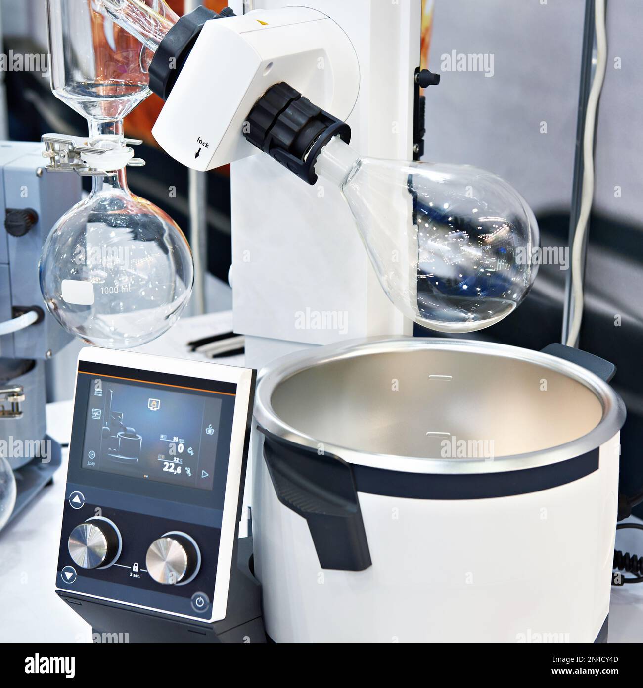 Laboratory rotary evaporator with chemical preparation in flask Stock