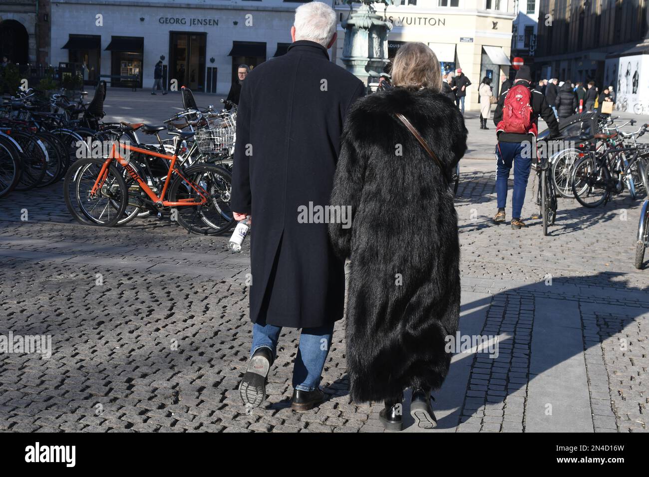 Copenhagen/Denmark/08 February 2023/ Rich senior citizen walk holding hand  in danish capital.  (Photo. Francis Joseph Dean/Dean Pictures) Stock Photo