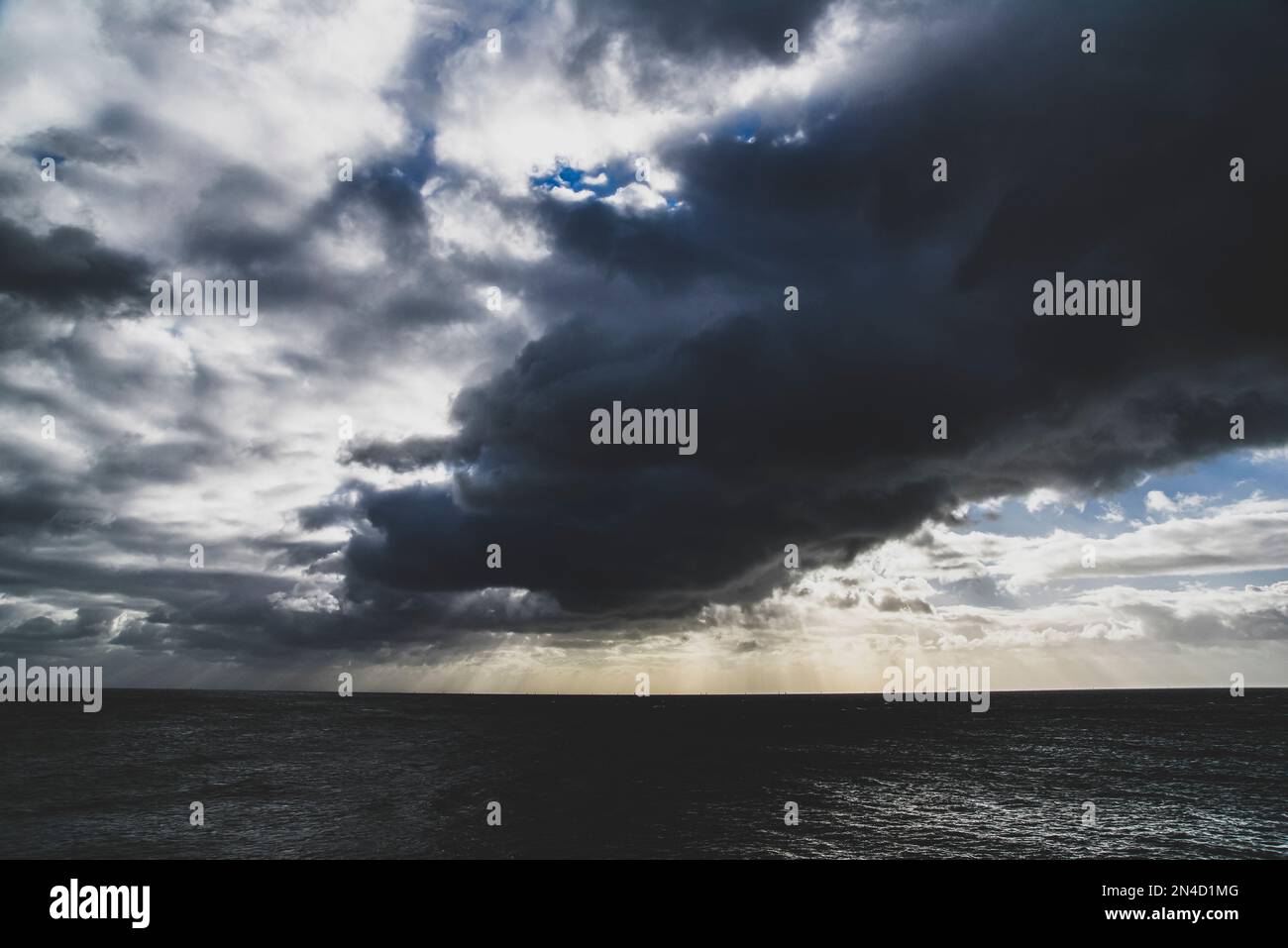 Gray clouds over ocean hi-res stock photography and images - Alamy