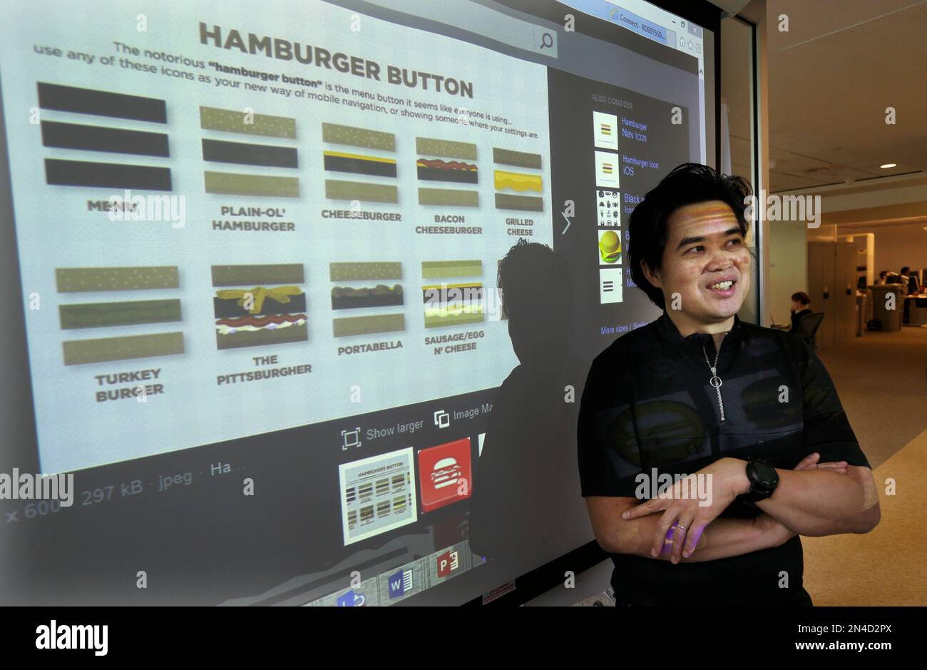 In this photo taken July 3, 2014, Albert Shum, who heads interaction ...
