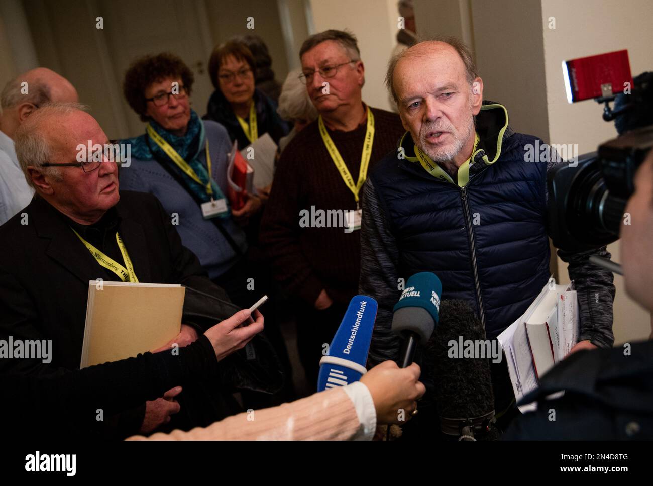 Stuttgart, Germany. 08th Feb, 2023. Andreas Salomon (r) speaks as a person affected by the Radical Decree after a meeting with Baden-Württemberg's Prime Minister Kretschmann about the conversation. Credit: Christoph Schmidt/dpa/Alamy Live News Stock Photo